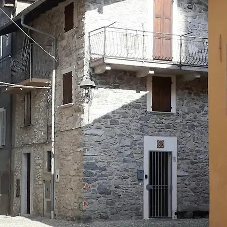 Typical Stone House With Balcony Оссуччо