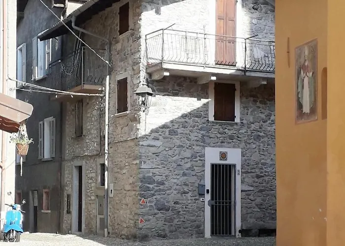 Typical Stone House With Balcony Оссуччо
